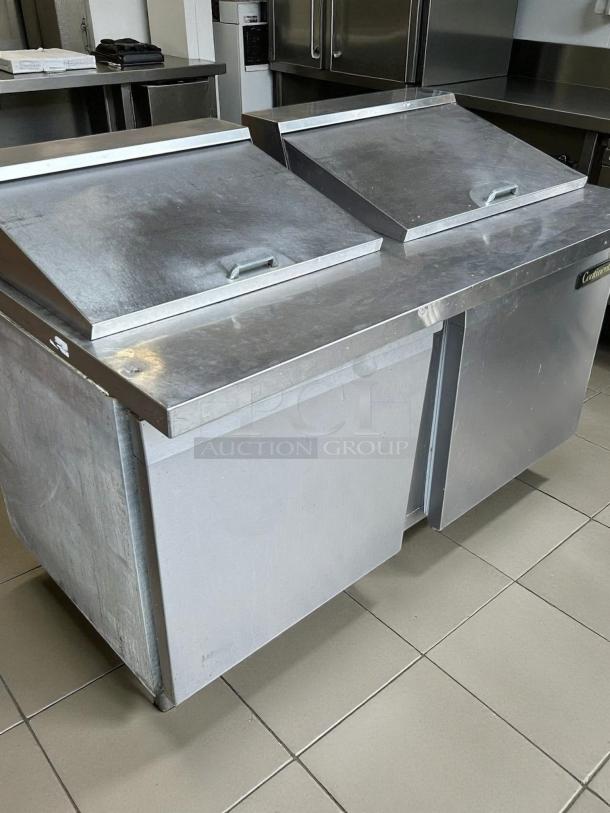 Continental SW60N24M 60" 2-door sandwich prep table. Stainless steel, mega top, handles. Tested, working condition.