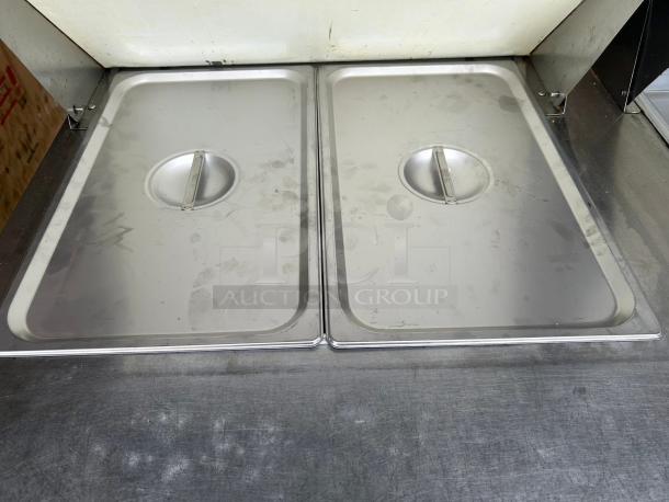 Continental SW60N24M 60" 2-door sandwich prep table in great condition, stainless steel, tested and working.