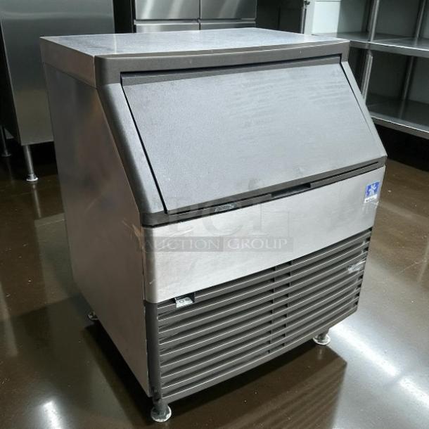 Manitowoc QD-0272A undercounter ice machine, 280 lb. production, 100 lb. storage, tested, stainless steel, excellent condition.