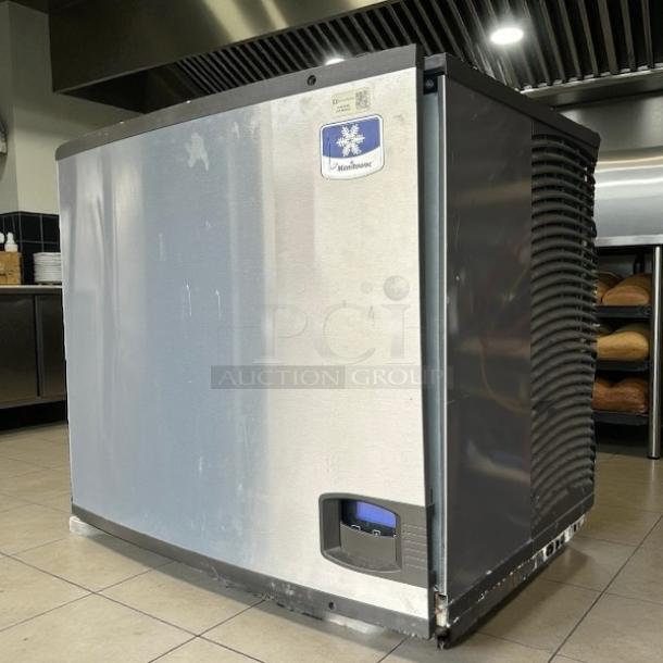 Manitowoc IYT0900A ice machine head, air cooled, half dice, 865 lbs capacity, tested working, stainless steel finish, visible logo.