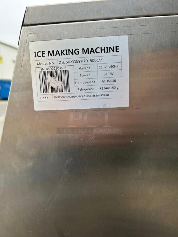 VEVOR ice maker, model ZBJ50KGSYP70-5001V1. Produces 110 lbs/day, 33 lbs storage. Tested, working condition. 310W, R134a refrigerant.