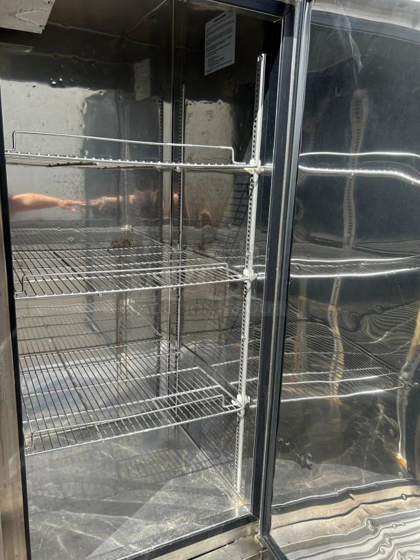 Turbo Air TSR-72SD-N refrigerator, excellent condition, interior view showing adjustable wire shelves and stainless finish.