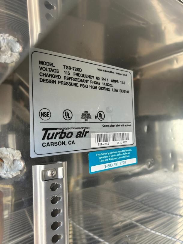 Turbo Air TSR-72SD-N refrigerator label, showing model, voltage, refrigerant details. Silver interior with NSF, UL certifications.
