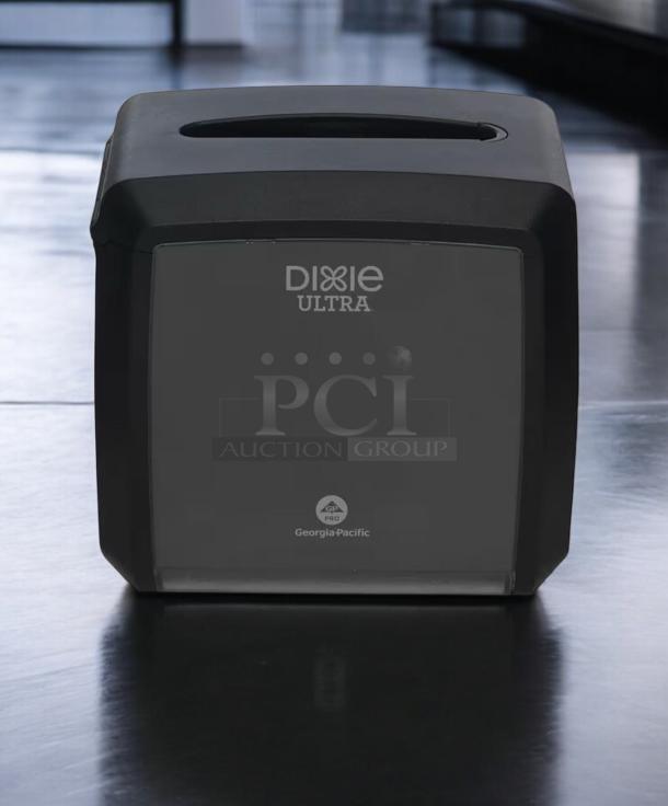 Dixie Ultra napkin dispenser, black, by Georgia-Pacific. Compact countertop model, 7.5"x5.86"x7.2", great condition, tested working.