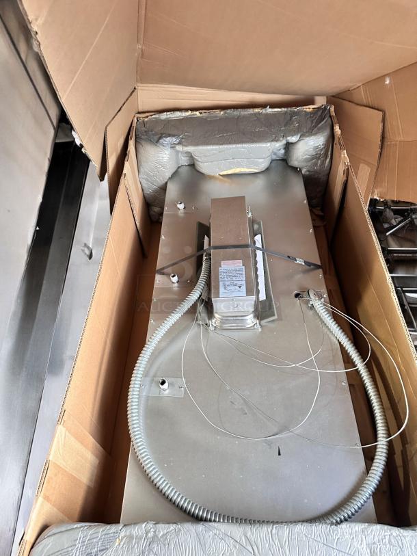 Brand new APW Wyott HFW-4D 4-well hot food table, electric, 208/240V, sealed in original packaging.