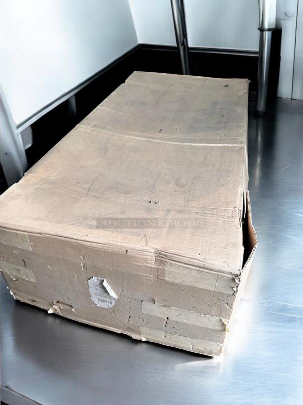 APW Wyott HFW-4D Hot Food Table, brand new in original sealed packaging. Model and voltage details labeled.