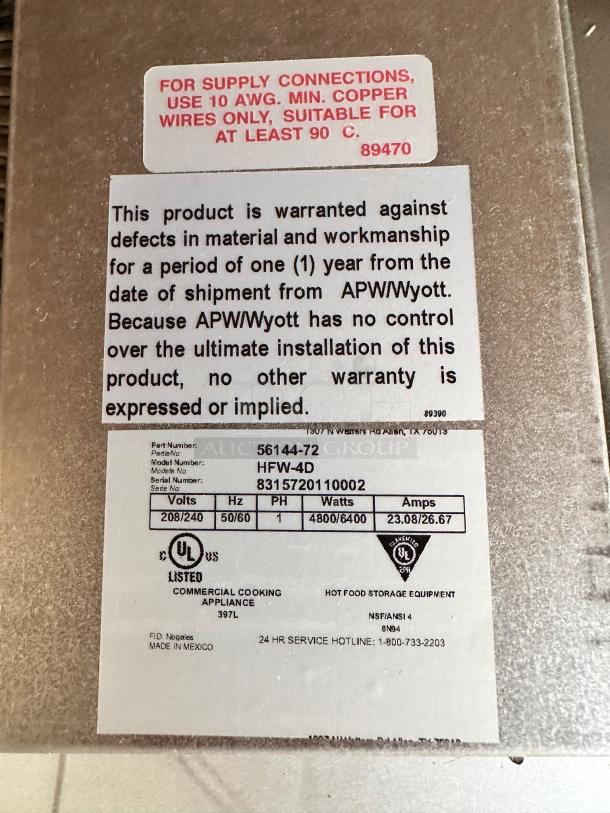 Brand new APW Wyott HFW-4D 4-Well Hot Food Table, electric 208/240V, sealed packaging, warranty sticker visible.