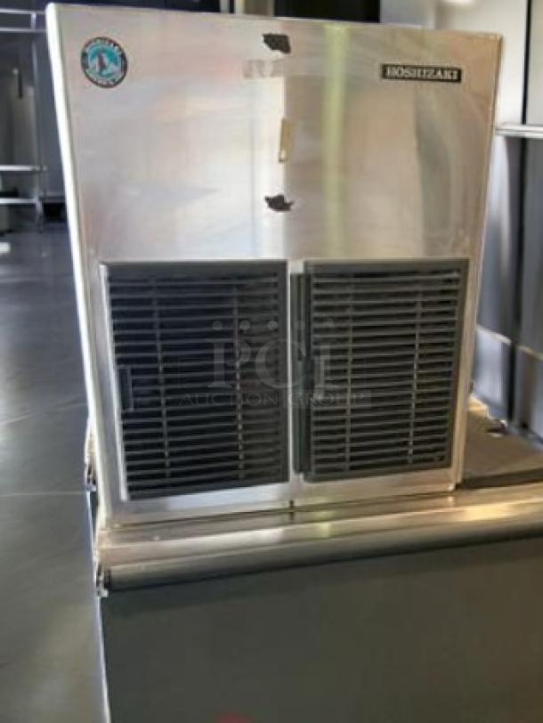 Hoshizaki F-1001MAJ-C flake ice maker with storage bin, excellent condition, fully tested, stainless steel exterior, 115V.