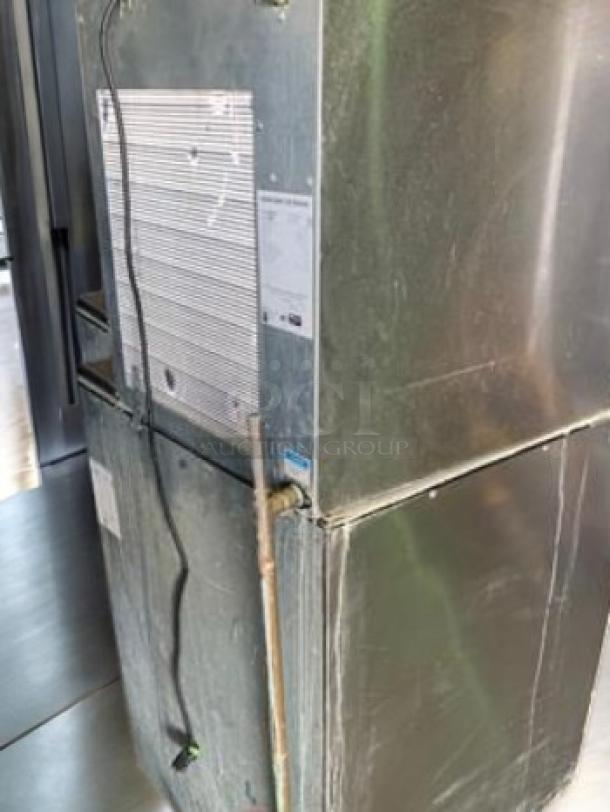 Hoshizaki F-1001MAJ-C flake ice maker with storage bin, excellent condition, 115V, fully tested. Visible labels and cords.