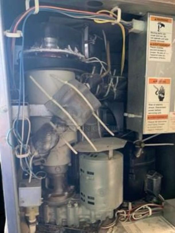 Hoshizaki F-1001MAJ-C flake ice maker in excellent condition, fully tested, with visible internal mechanics and wiring, 115V.