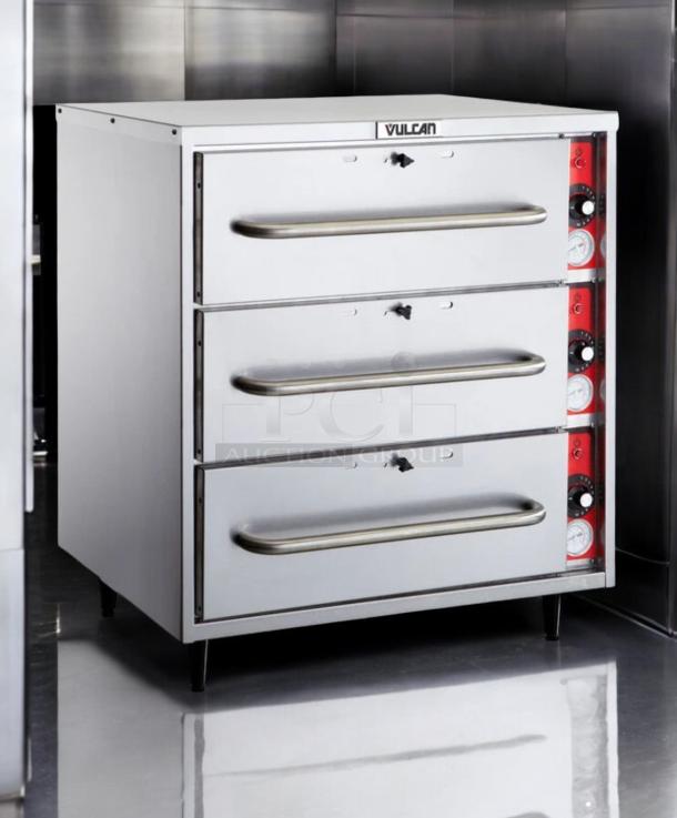 Vulcan VW3S three-drawer warming cabinet, outstanding condition, fully tested, 120V, stainless steel with control dials.