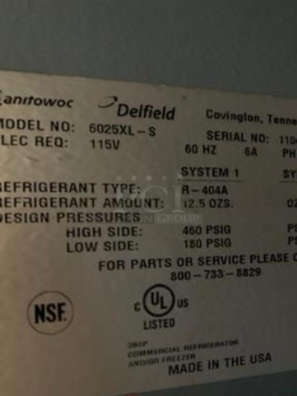Delfield 6025XL-S single door commercial refrigerator label showing model, voltage, refrigerant type, and UL certification.