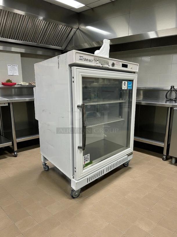 Turbo Air TSU-4RW-N6 vaccine refrigerator, glass door, tested, working, minor exterior wear, on wheels, visible brand label.