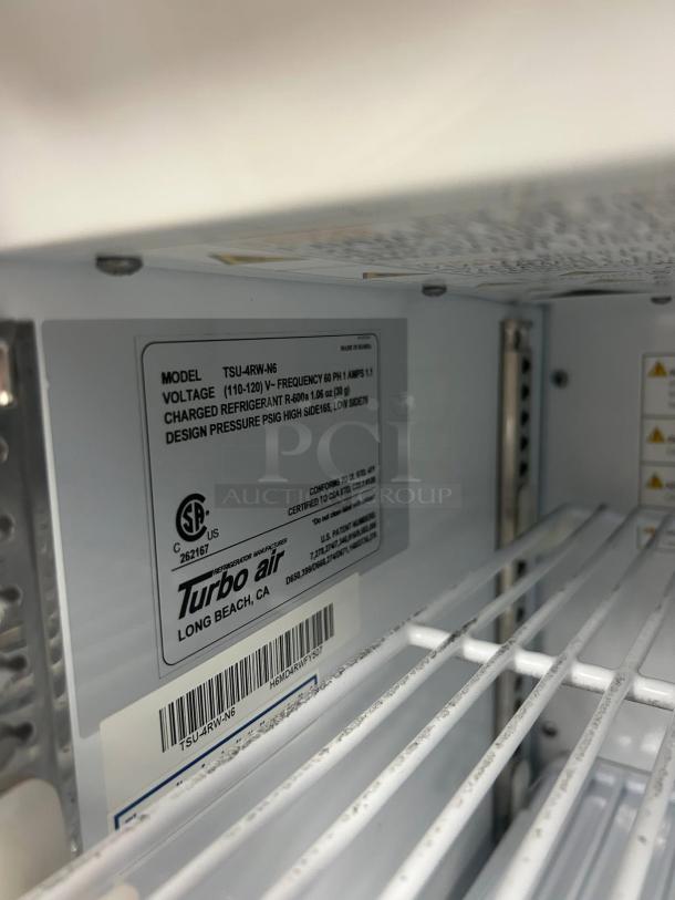 Turbo Air TSU-4RW-N6 vaccine refrigerator, tested and working. Label shows model, voltage, and refrigerant info. Clean condition.