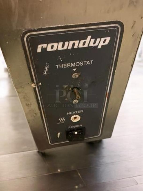 A.J. Antunes VCT-1000CV toaster control panel with "roundup" branding, thermostat, heater, and power settings visible.