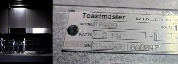 Toastmaster TP409 commercial toaster, 4-slot, 120V, excellent condition, fully tested and working, model plate visible.