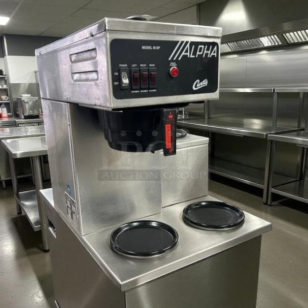Curtis ALPHAIII-SP-10 Coffee Brewer, great condition, 12 cup capacity, 3 lower warmers, 120/220V, tested and working.