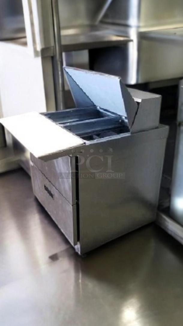 Delfield 4400EL-N12M-A21 refrigerated prep base with drawers, excellent condition, stainless steel, fully tested, 115V.