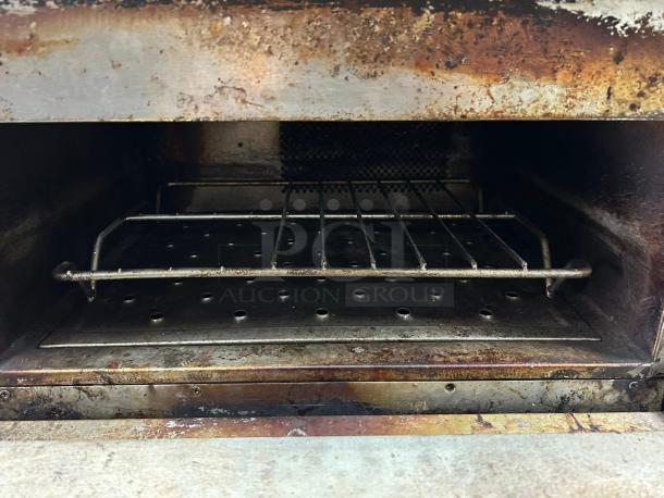 TurboChef I3 rapid cook convection/microwave oven interior, showing racks and signs of use, tested and in excellent condition.