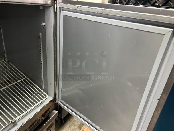 Beverage Air UCR48AHC 48" refrigerator in great condition, open door showing interior shelving and clean surfaces.