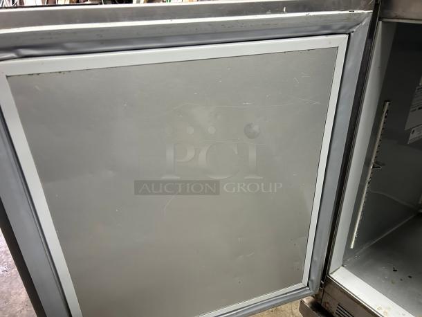 Beverage Air UCR48AHC 48" undercounter refrigerator, dual section, good condition, visible internal label indicating specs.