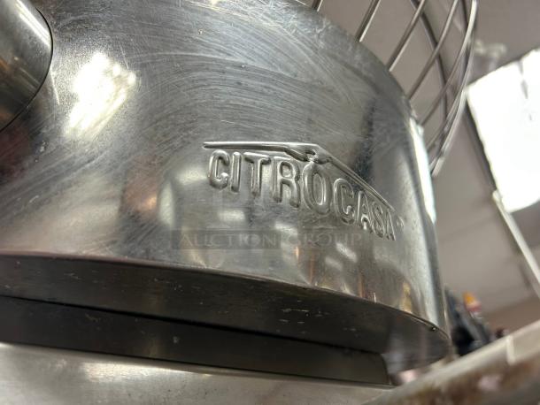 Citrocasa 8000 SB-ATS citrus juicer in excellent condition, showing metallic finish and brand marking.