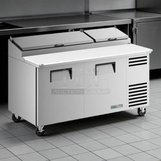 True TPP-AT-67-HC refrigerated pizza prep table, 67 3/8" with 2 doors. Tested and working. Features durable stainless steel.