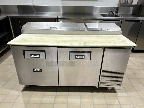 True TPP-AT-67-HC refrigerated pizza prep table, 67 3/8", two doors, tested, working, labeled compartments, stainless steel.
