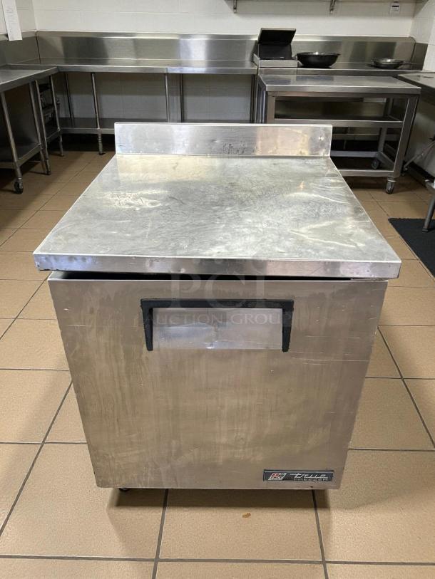 True TWT-27F-HC 27 5/8" worktop freezer, excellent condition, 3 9/16" backsplash, tested and working, visible brand label.