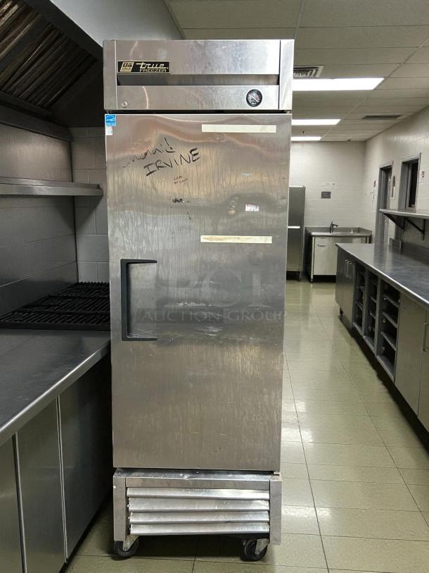 True T-23F-HC LH 27" solid door reach-in freezer in excellent condition. Tested and working. Markings visible on the door.