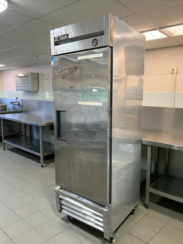 True T-23F-HC 27" solid door reach-in freezer in excellent condition, tested and working. Stainless steel exterior.