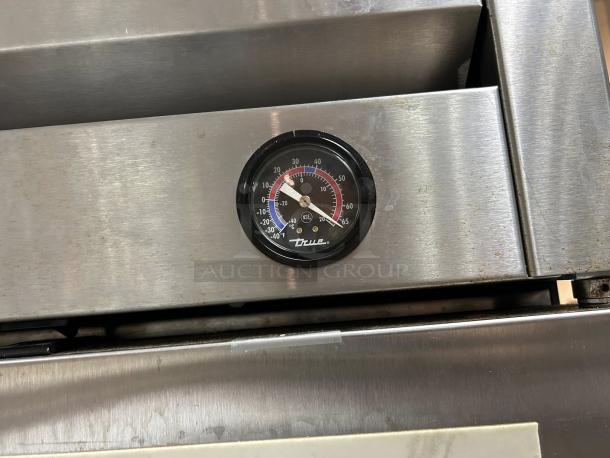 True T-23F-HC 27" solid door reach-in freezer in excellent condition, visible gauge and True logo, stainless steel finish.
