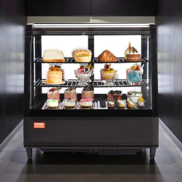 VEVOR refrigerated display case, model XCW-100L, 3.5 cu. ft., 2-tier, showcases pastries. Tested, working, commercial use.