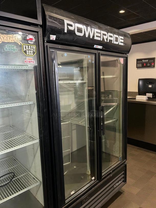 True GDM-43-HC~TSL01 refrigerated merchandiser, black, excellent condition, glass doors, tested and working, 47 1/8" size.