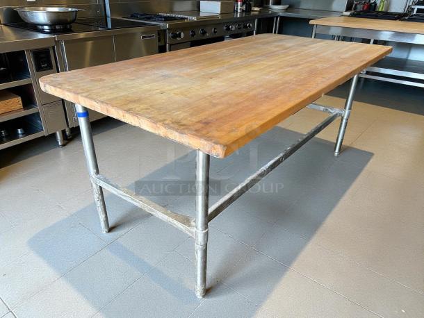 John Boos butcher block worktable with open base, great condition. Wooden top, metal legs, ideal for kitchen use.