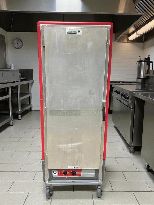 Metro C539-HFS-U heated holding cabinet, excellent condition, solid door, red trim, on wheels, tested and working.