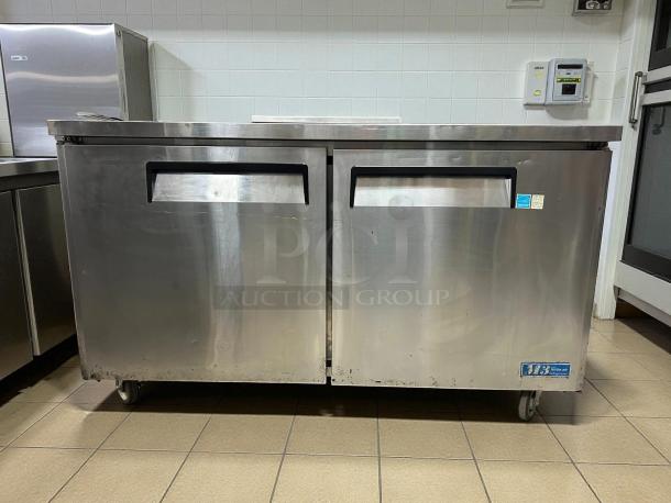 Turbo Air MUR-60-N undercounter refrigerator, 60 1/4"W, two-section, two-door, stainless steel, tested, 115v, on casters.