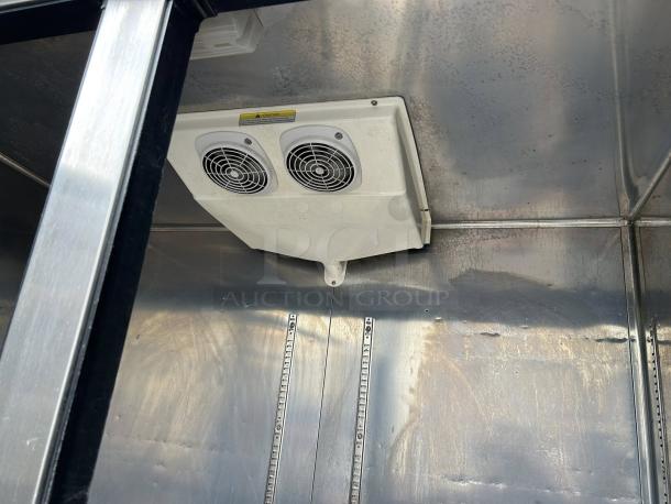 Everest Refrigeration EBR2 interior, showing dual fan cooling unit in a stainless steel reach-in refrigerator.