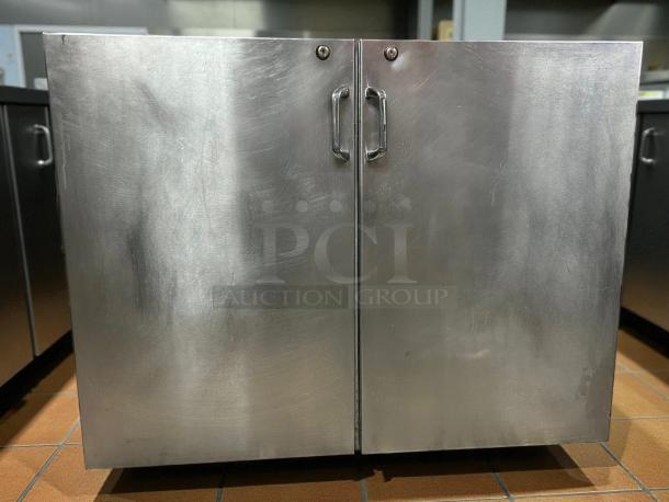 INFINITY IBCRS-2D-SSD 37" high backbar refrigerator with 2 doors in excellent condition. Stainless steel finish, tested and working.