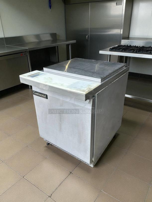 Continental Refrigerator SW27-N-12M sandwich prep table, 27", stainless steel, one door, marble top, great condition, tested.