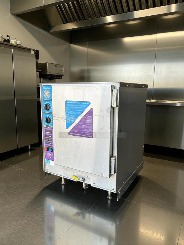 Groen XS-208-12-3 electric convection steamer, 23-inch, boilerless with external heating, tested, stainless steel finish.