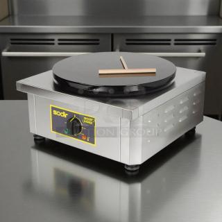 Equipex 400E crepe machine; 15-3/4” cast iron plate, stainless steel body, excellent condition, tested and working.