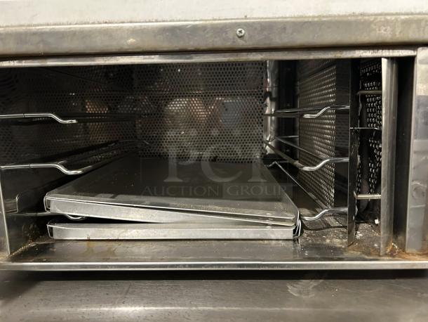 Otis Spunkmeyer Model OS-1 convection cookie oven with two trays, tested and working, in used condition.