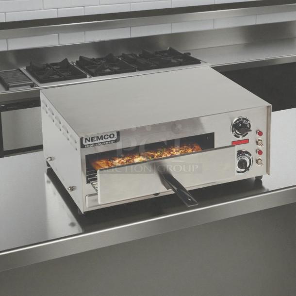 Nemco 6210 countertop oven, stainless steel, tested and working, features temperature control and indicator lights.
