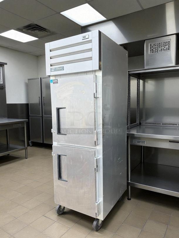 True STG1R-2HS-HC refrigerator, 27.5", one-section, two right-hinge solid doors, stainless steel, tested and working.