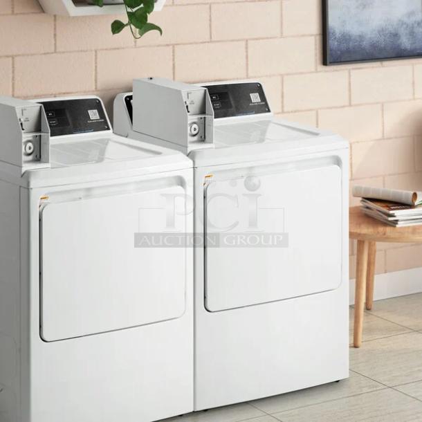 GE DCCD330EDWC 7.0 Cu. Ft. Coin-Operated Electric Dryer, excellent condition, tested and working, in a commercial setting.