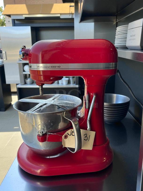 KitchenAid Professional 6000HD Artisan Stand Mixer in red, tested working, with metal bowl and label reading "31".
