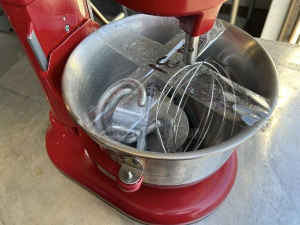 KitchenAid Professional 6000HD Artisan Series Tilt-Head Stand Mixer in red, tested and working, featuring accessories.