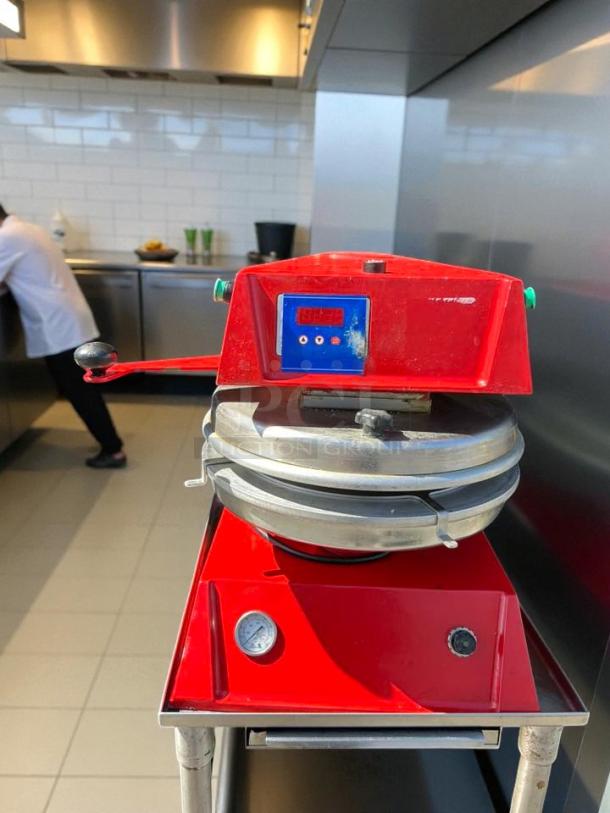 Proluxe DP2300 12" semi-automatic pizza press in excellent condition, 208V, digital display, no stand, tested and working.