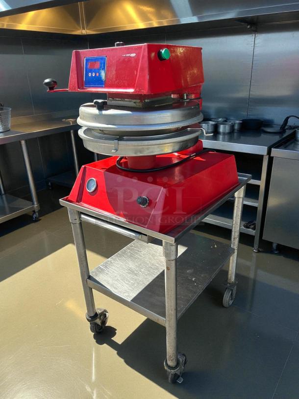 Proluxe DP2300 semi-automatic 12" pizza press, excellent condition, 208V, red, tested and working, no stand.